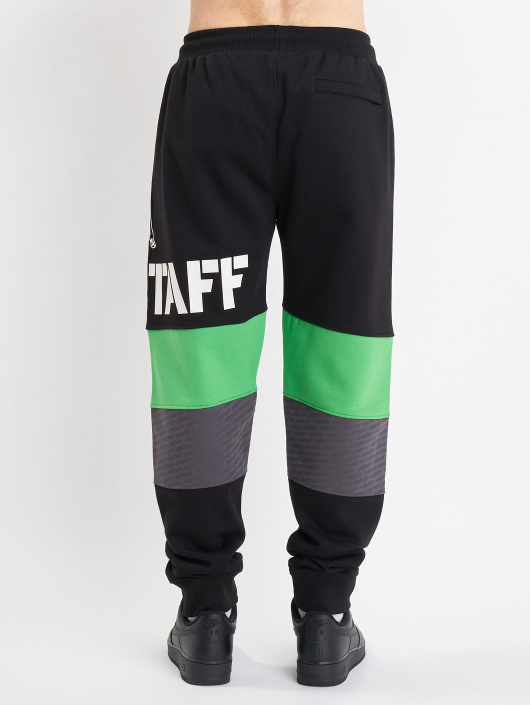 Black and green sweatpants on sale